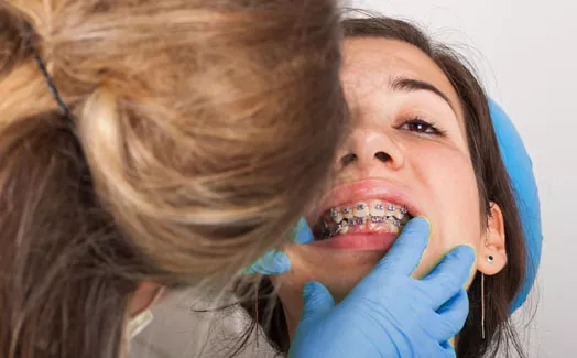 Examining patient's mouth