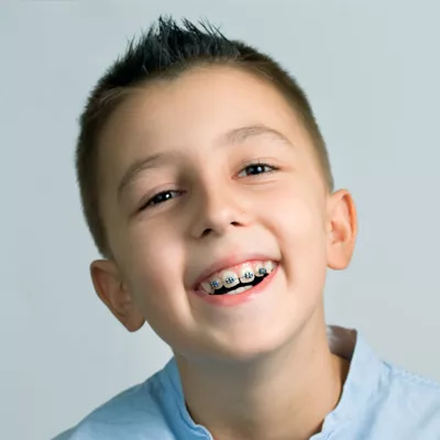 Smiling boy with braces