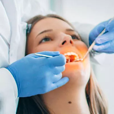 Woman undergoing dental exam